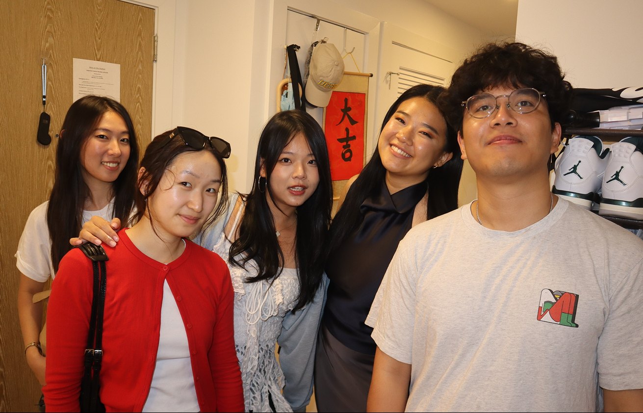 Friends in a dorm hallway